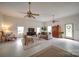 This living room offers plenty of seating and three ceiling fans at 801 Witmore Rd, Wingate, NC 28174