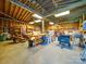 View of the interior of the outbuilding with a workbench and plenty of workspace at 801 Witmore Rd, Wingate, NC 28174