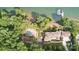 Aerial view of an estate with a backyard swimming pool and extensive landscaping at 9184 Greenwood Rd, Terrell, NC 28682