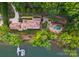 Aerial view of home with inground pool and private boat dock on Lake Norman at 9184 Greenwood Rd, Terrell, NC 28682