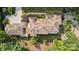 Stunning aerial view of expansive estate with manicured landscaping and intricate roof design at 9184 Greenwood Rd, Terrell, NC 28682