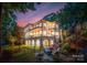 Spacious backyard with outdoor fireplace and covered patio on Lake Norman waterfront property at 9184 Greenwood Rd, Terrell, NC 28682