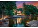 Beautiful lakefront view from the backyard featuring a private dock and lush landscaping at 9184 Greenwood Rd, Terrell, NC 28682