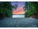 Private beach with sandy shores offers serene water views and direct access, surrounded by lush greenery for ultimate relaxation at 9184 Greenwood Rd, Terrell, NC 28682