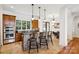 Well-equipped kitchen with stainless steel appliances, custom cabinetry, and bar seating at 9184 Greenwood Rd, Terrell, NC 28682