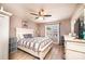 Charming bedroom with light-colored wood floors, a ceiling fan, and a bright window at 102 Brandywine Ne Dr # O-3, Conover, NC 28613
