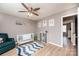 Bright Bedroom with a crib and an armchair at 102 Brandywine Ne Dr # O-3, Conover, NC 28613