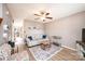 A cozy living room features neutral walls, ceiling fan, modern furniture, and stylish decor at 102 Brandywine Ne Dr # O-3, Conover, NC 28613