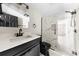 Modern bathroom with stylish vanity, black fixtures, and a glass-enclosed shower at 103 Fleetwood Rd, York, SC 29745