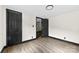 Inviting bedroom with neutral walls, wood-look floors, and dark-colored trim at 103 Fleetwood Rd, York, SC 29745
