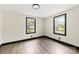 Bright bedroom with light-colored walls, wood-look floors, and natural light at 103 Fleetwood Rd, York, SC 29745
