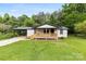 Inviting one-story home featuring a covered front porch and well-maintained lawn and carport at 103 Fleetwood Rd, York, SC 29745