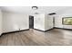 Bright living area with neutral walls, modern flooring, and dark trim at 103 Fleetwood Rd, York, SC 29745