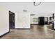 A spacious living room leading into an updated kitchen area with lots of natural light at 103 Fleetwood Rd, York, SC 29745
