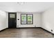 Inviting living room with a black front door, light-colored walls, and natural light at 103 Fleetwood Rd, York, SC 29745