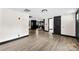 Open-concept living area with modern floors seamlessly connecting to the kitchen space at 103 Fleetwood Rd, York, SC 29745