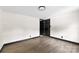 Spacious room showcasing wood-look flooring, black trim, and recessed lighting at 103 Fleetwood Rd, York, SC 29745
