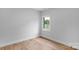 Bedroom with light hardwood flooring and a single window at 105 Churchill Dr, Kings Mountain, NC 28086