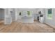 Bright, modern kitchen features white cabinets, an island, and stainless steel appliances at 105 Churchill Dr, Kings Mountain, NC 28086