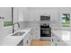 Well-lit kitchen with modern appliances, white countertops, and plenty of storage at 105 Churchill Dr, Kings Mountain, NC 28086