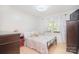 Cozy bedroom with a comfortable bed and window provides a peaceful retreat for rest and relaxation at 109 Larch Rd, Salisbury, NC 28147