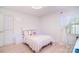 Cozy bedroom with decor, a light wood floor and a bright window view at 109 Larch Rd, Salisbury, NC 28147
