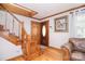 Entryway with hardwood floors, staircase, and a wooden front door at 109 Larch Rd, Salisbury, NC 28147