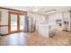 Bright kitchen with stainless steel appliances, center island, and access to the backyard at 109 Larch Rd, Salisbury, NC 28147