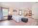 Spacious main bedroom with natural light, wood floors, and ample closet space at 109 Larch Rd, Salisbury, NC 28147