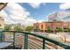 City view from balcony with table and chairs perfect for entertaining at 115 E Park Ave # 409, Charlotte, NC 28203