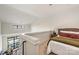 Bedroom with sitting area, upstairs loft, and neutral color scheme at 115 E Park Ave # 409, Charlotte, NC 28203