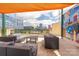 Roof deck featuring seating areas, and panoramic city skyline views at 115 E Park Ave # 409, Charlotte, NC 28203