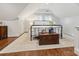 Inviting bedroom with vaulted ceilings, hardwood floors, and a comfortable wrought iron bed at 1219 Pinecrest Ave, Charlotte, NC 28205