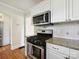 Updated kitchen featuring stainless steel appliances and a gas range at 1219 Pinecrest Ave, Charlotte, NC 28205