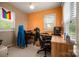 This cozy room has ample workspace with a view and vibrant decor at 123 N Poston St, Shelby, NC 28150