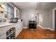 Functional kitchen featuring original cabinetry, hard wood floors, and a stainless steel range at 123 N Poston St, Shelby, NC 28150