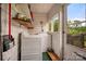Practical laundry area with washer, dryer, and a window offering natural light and outdoor views at 123 N Poston St, Shelby, NC 28150