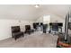 Carpeted bonus room featuring multiple work stations and comfortable seating at 1405 Amberlight Cir, Salisbury, NC 28144