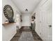 Inviting entryway with gray floors, decorative mirrors, and a view into other rooms at 1405 Amberlight Cir, Salisbury, NC 28144