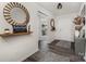 Stylish entryway with decorative mirrors, gray flooring, and a welcoming atmosphere at 1405 Amberlight Cir, Salisbury, NC 28144