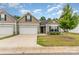Charming single-story home featuring a one car garage, well-manicured lawn and lovely curb appeal at 1405 Amberlight Cir, Salisbury, NC 28144