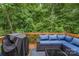 Outdoor patio featuring wicker furniture set with plush cushions and a sleek coffee table at 1405 Amberlight Cir, Salisbury, NC 28144