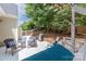 Backyard featuring a deck area, comfortable seating, a grill, and view of a wooded landscape at 14218 Springsure Ct, Huntersville, NC 28078