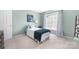 Comfortable bedroom featuring a dresser and natural light at 14218 Springsure Ct, Huntersville, NC 28078