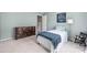 Comfortable bedroom featuring a dresser and natural light at 14218 Springsure Ct, Huntersville, NC 28078