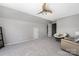 Spacious bonus room featuring neutral paint and a ceiling fan at 14218 Springsure Ct, Huntersville, NC 28078