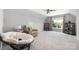 Spacious bonus room featuring a cozy chair, neutral paint, and a large window offering scenic views at 14218 Springsure Ct, Huntersville, NC 28078