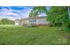 Backyard view of home with deck and garage at 1435 W Ridge Rd, Salisbury, NC 28147