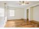Bedroom featuring hardwood floors, natural lighting, and a built-in closet at 1435 W Ridge Rd, Salisbury, NC 28147