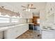Spacious kitchen featuring white cabinets, a double basin sink, and a ceiling fan at 1435 W Ridge Rd, Salisbury, NC 28147